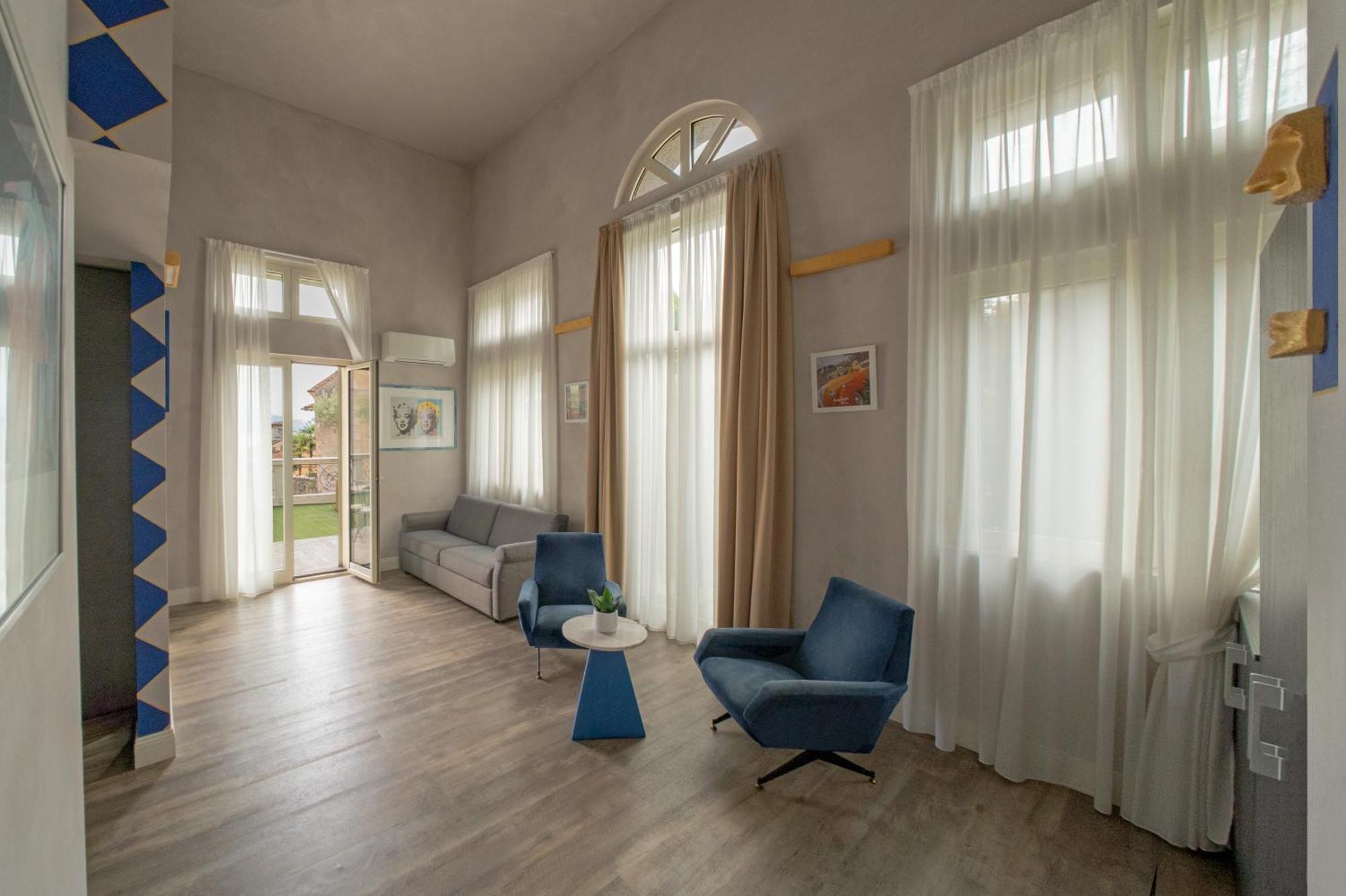 Hotel Al Campanile - Luxury Suites & Apartments Μπαβένο Εξωτερικό φωτογραφία