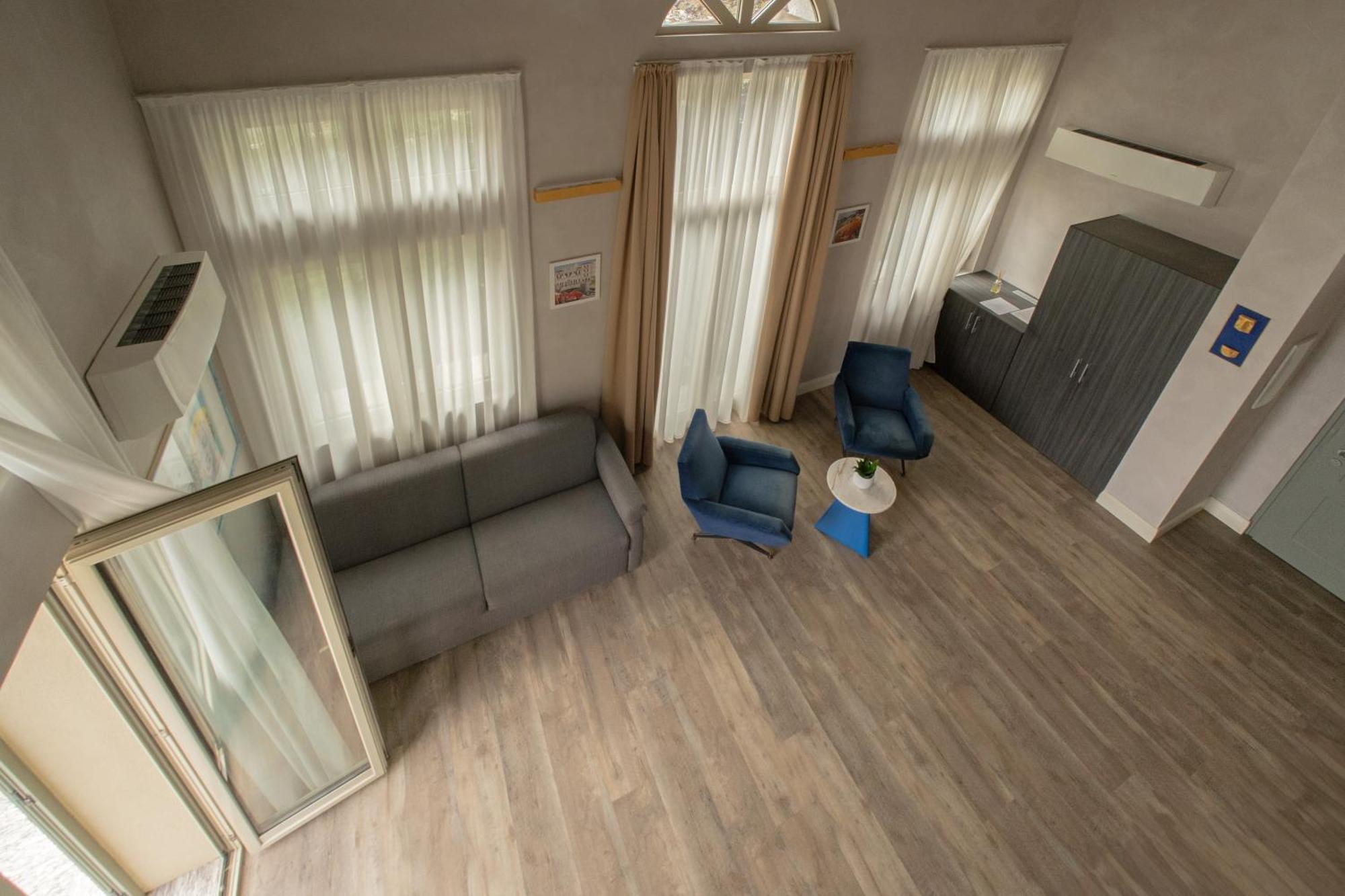 Hotel Al Campanile - Luxury Suites & Apartments Μπαβένο Εξωτερικό φωτογραφία
